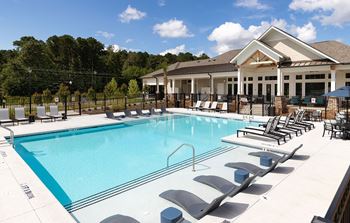 Swimming pool with relaxing sundecks